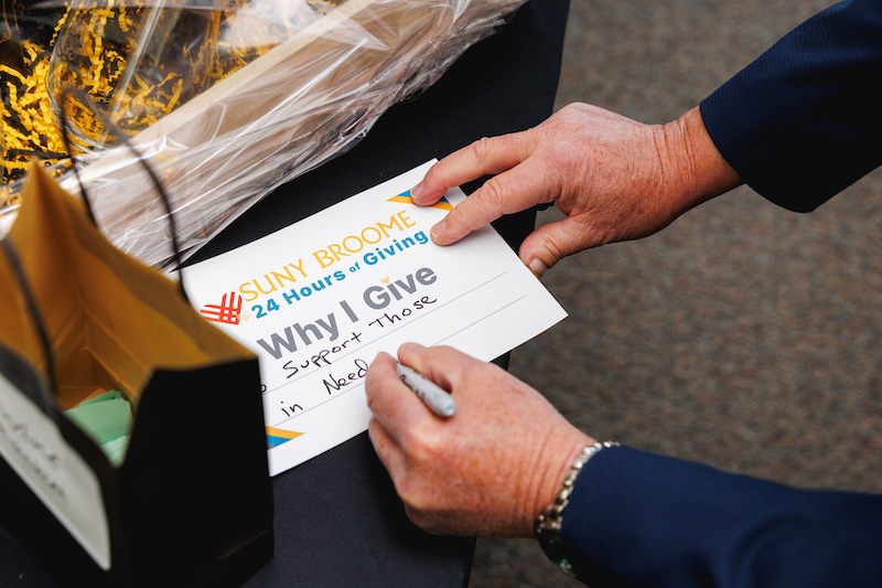 person donating to foundation