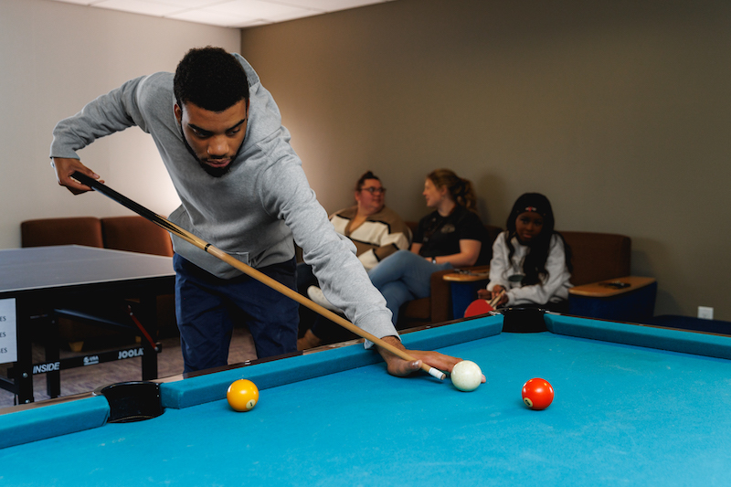 SV-Photos-SP-24-4 student village student playing pool