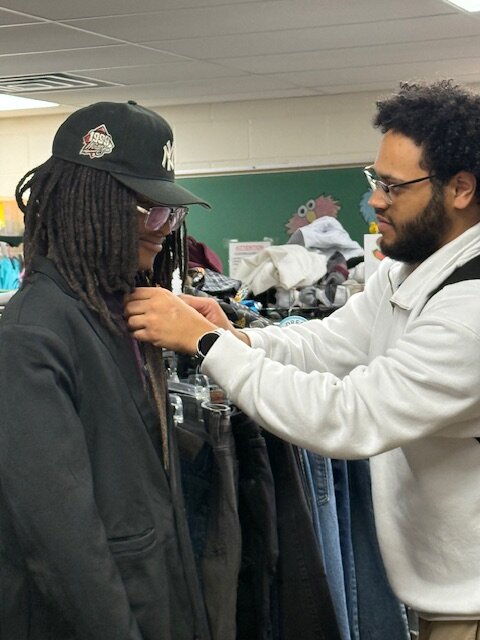 hornet hope center student trying on clothing