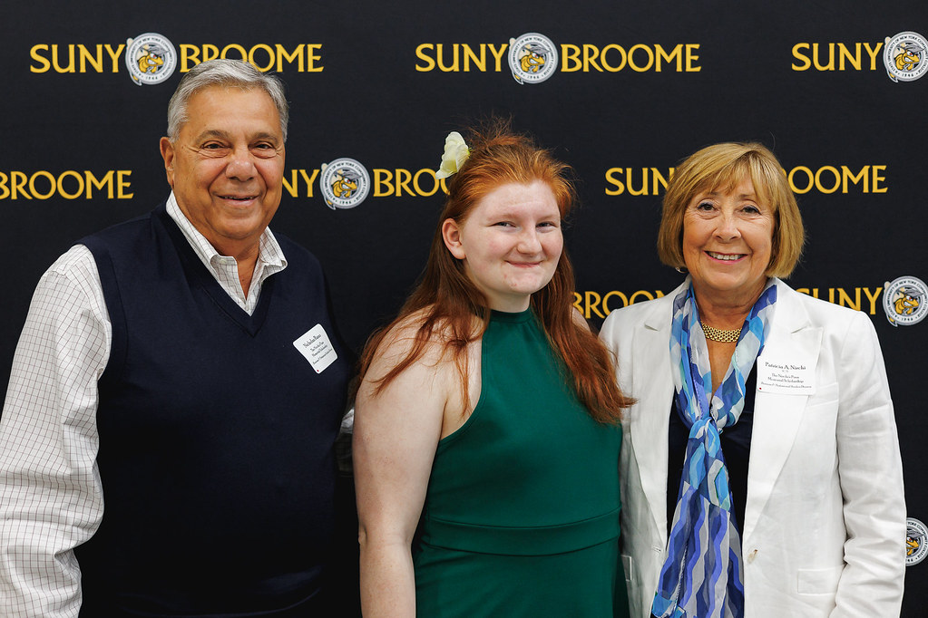 Kelsey smiles and poses with her donors