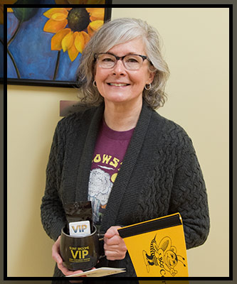 Noreen holds up her VIP gifts