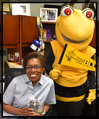 Dr. Ross-Scott smiles with Stinger.