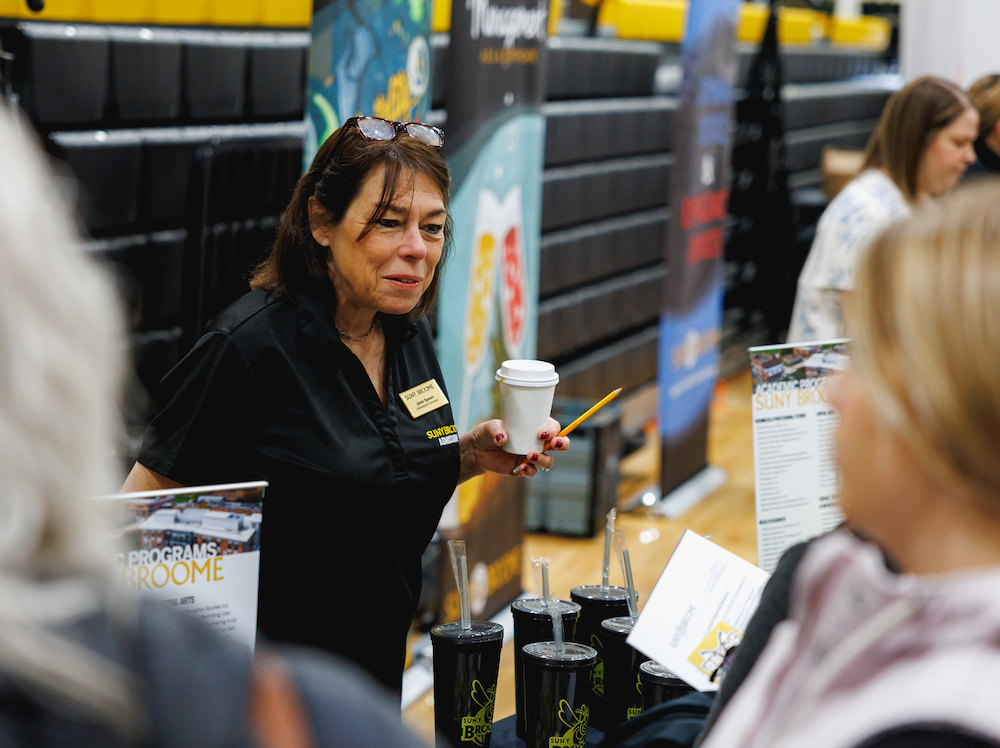admissions counselor student speaking with admissions counselor