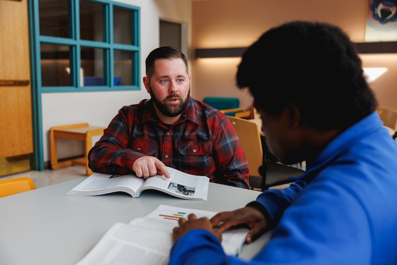 Deciding on Major student working with advisor deciding on major