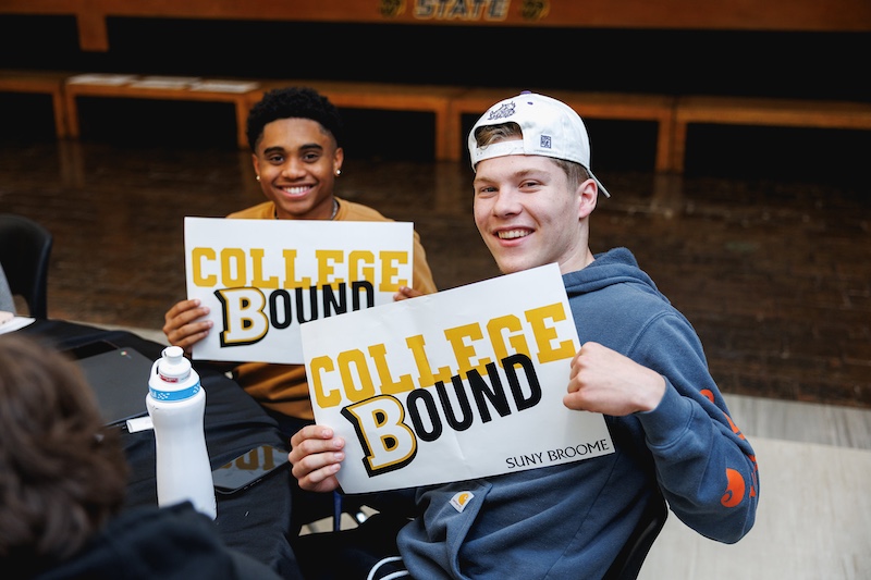 suny broome first time student high school students holding college acceptance signs