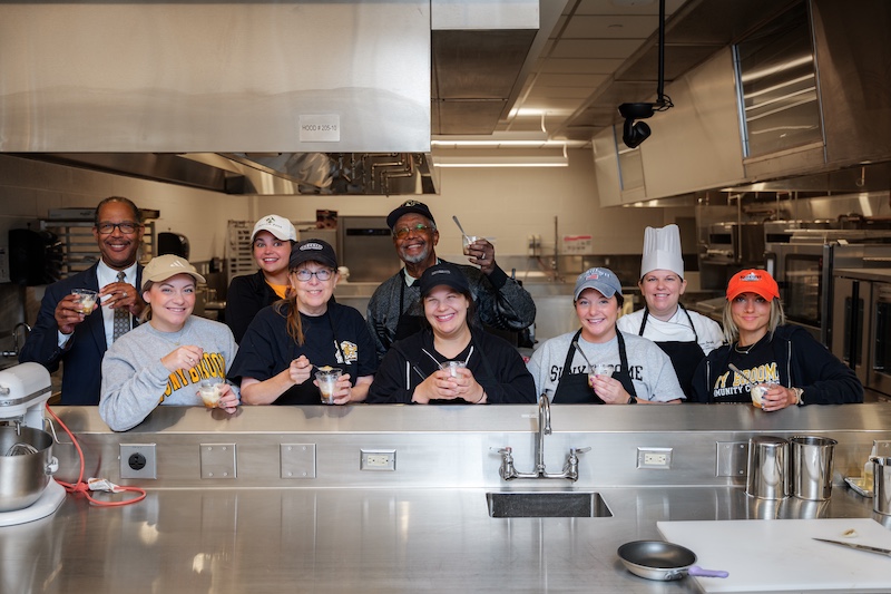 team building group photo at culinary and event center