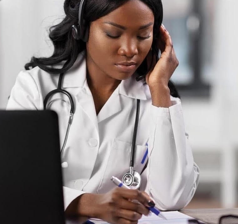 health Studies Woman with Stethoscope At a Desk
