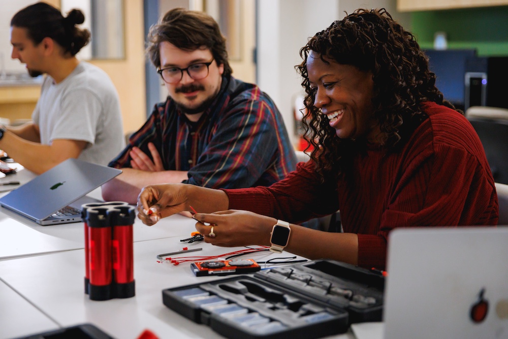 students working in battery lab