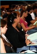 Students in chairs in a lecture hall